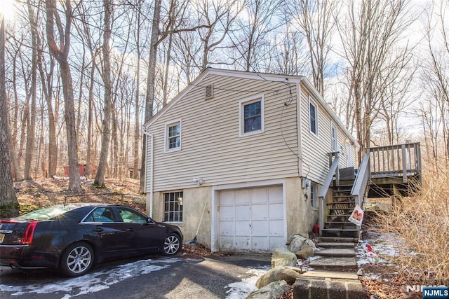 view of home's exterior with a garage