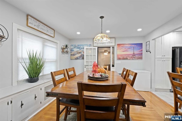 dining space featuring light hardwood / wood-style flooring