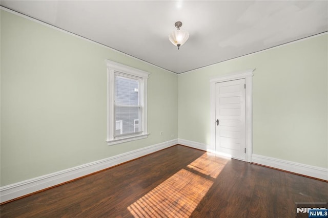 empty room featuring hardwood / wood-style floors