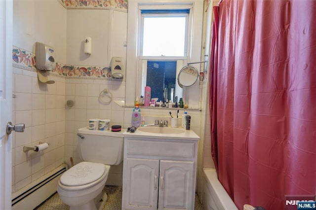 full bathroom with toilet, tile walls, vanity, shower / bathtub combination with curtain, and a baseboard heating unit