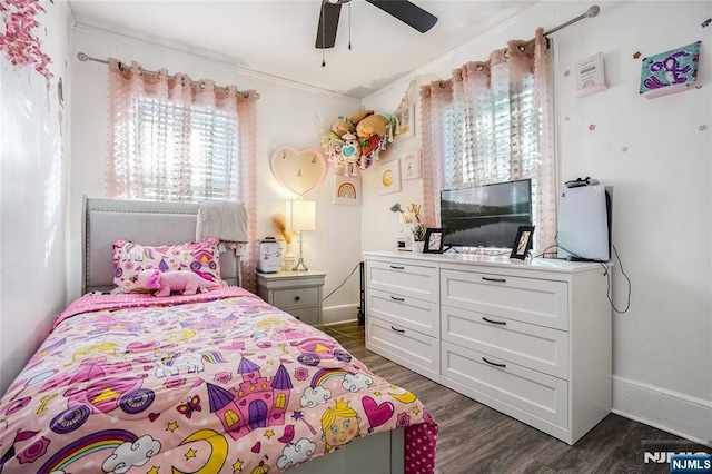 bedroom with dark wood-type flooring