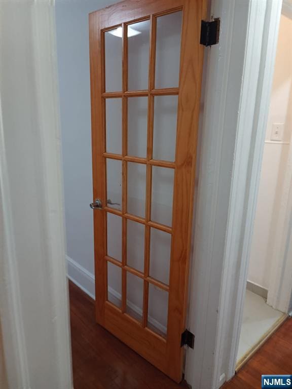 interior details featuring hardwood / wood-style floors