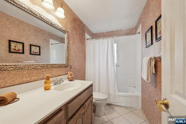 full bathroom featuring tile patterned flooring, vanity, shower / bath combination with curtain, and toilet