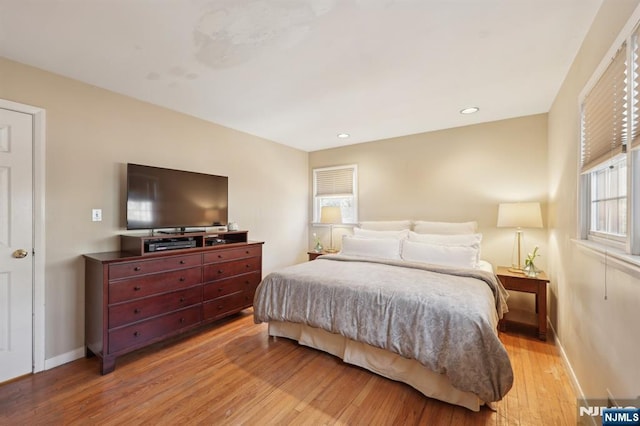 bedroom featuring light wood-type flooring