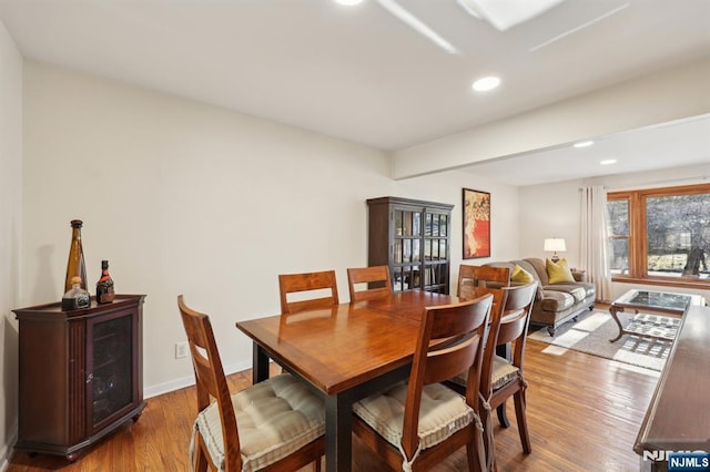 dining area featuring wood-type flooring