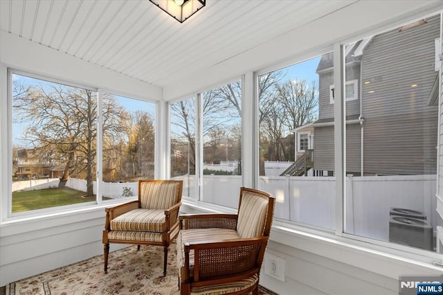 sunroom / solarium with a wealth of natural light