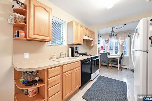 kitchen featuring black dishwasher, pendant lighting, freestanding refrigerator, light countertops, and open shelves