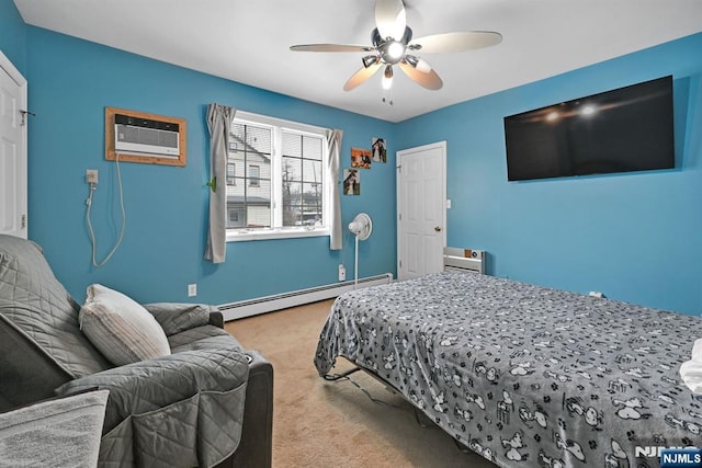 bedroom with a baseboard heating unit, an AC wall unit, a ceiling fan, and light colored carpet