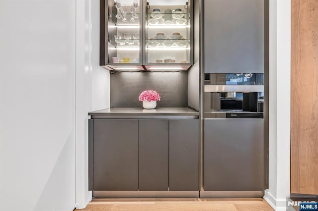bar with gray cabinetry