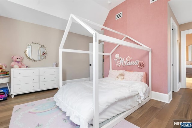 bedroom featuring hardwood / wood-style floors