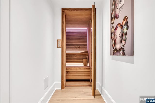 view of sauna / steam room with hardwood / wood-style floors