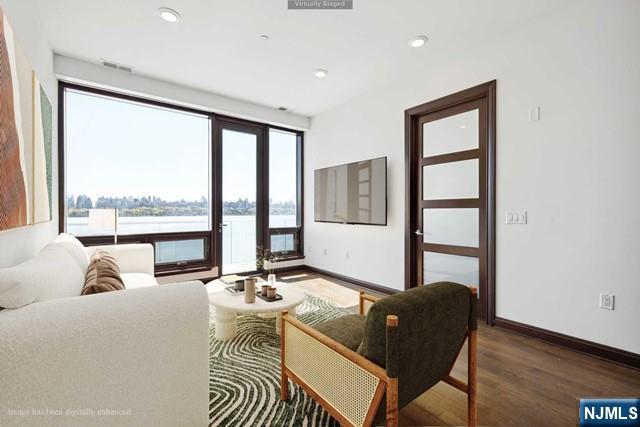 living room with hardwood / wood-style flooring