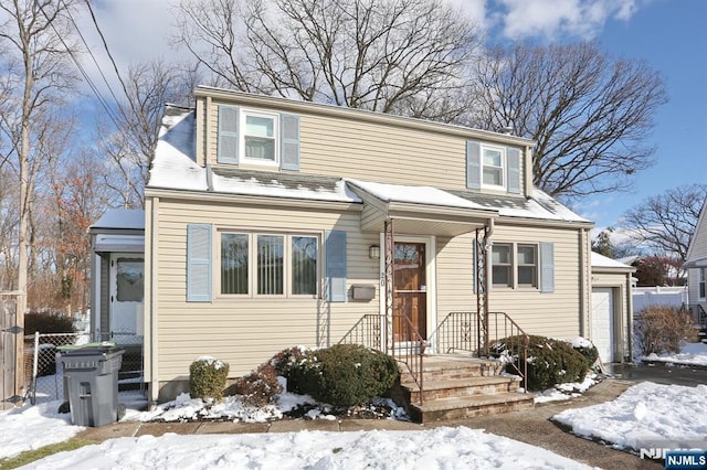 front of property featuring a garage