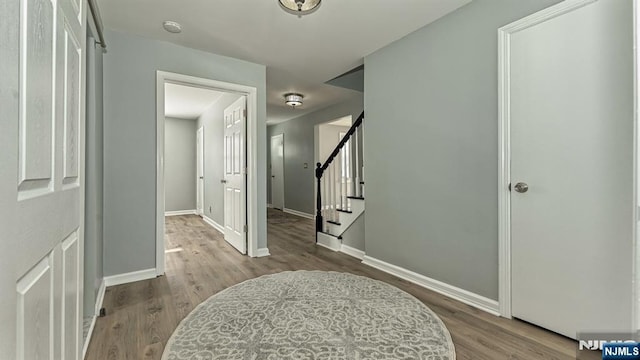 foyer with light hardwood / wood-style floors