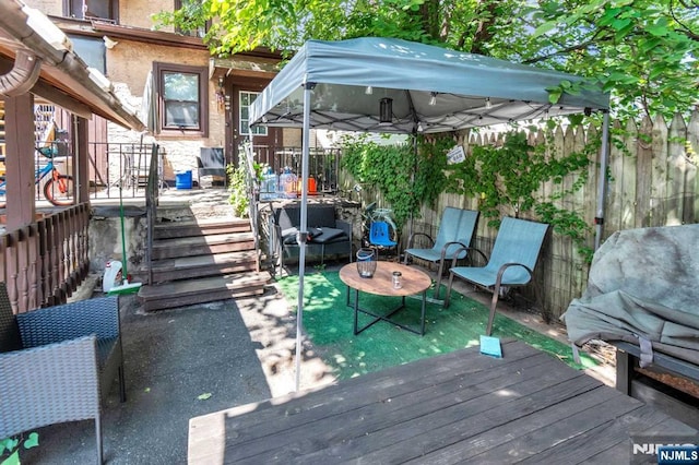 wooden deck with grilling area