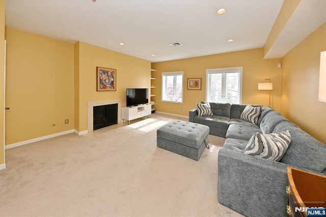 living room with light colored carpet