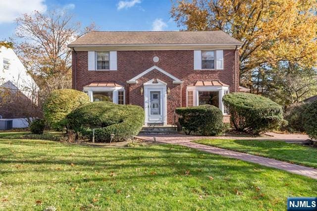 colonial house with a front yard