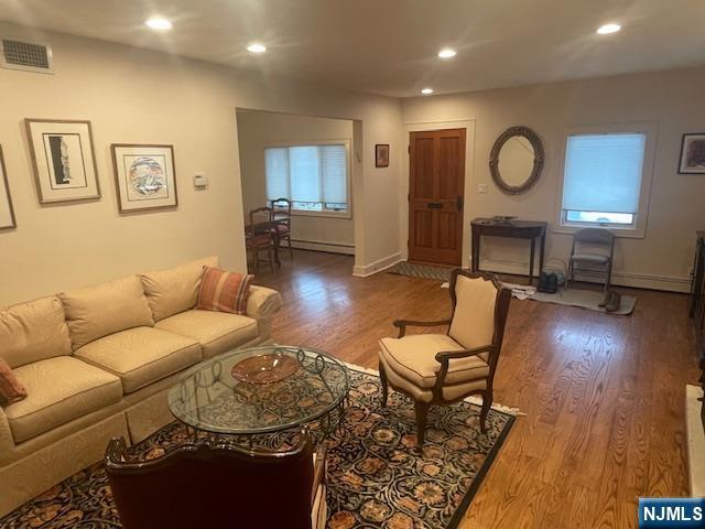 living room featuring light wood-type flooring