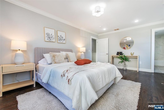 bedroom featuring ornamental molding, ensuite bathroom, and dark hardwood / wood-style flooring