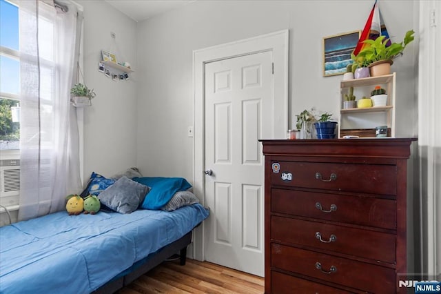 bedroom featuring light hardwood / wood-style floors