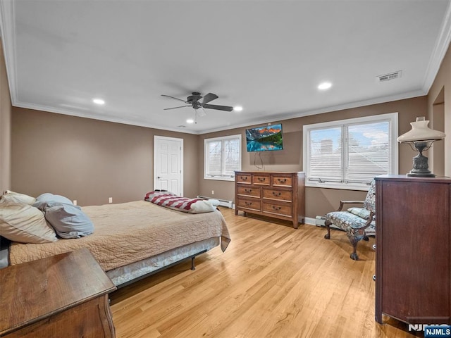 bedroom featuring a baseboard heating unit, crown molding, light hardwood / wood-style floors, and ceiling fan