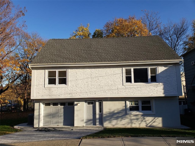 front of property featuring a garage