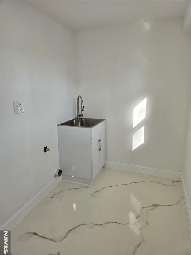 laundry area featuring sink