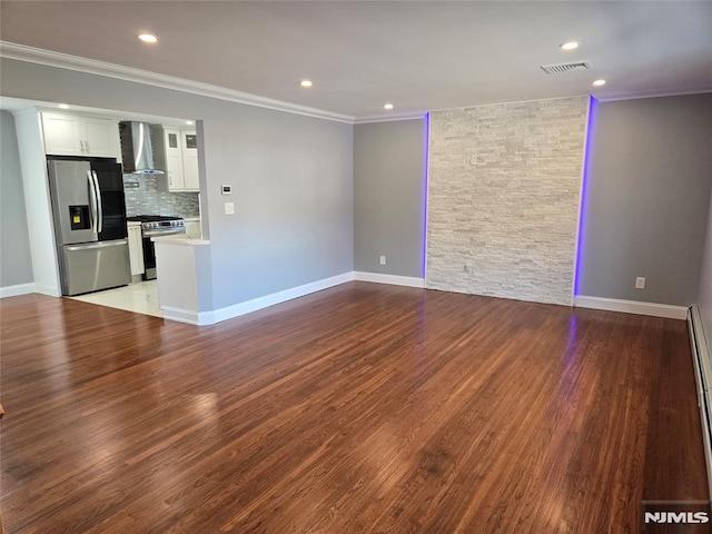 unfurnished living room with ornamental molding, light wood-type flooring, and a baseboard radiator