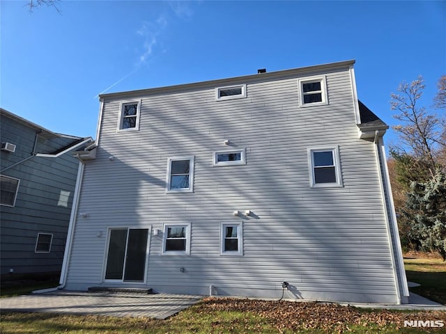 rear view of property with a patio