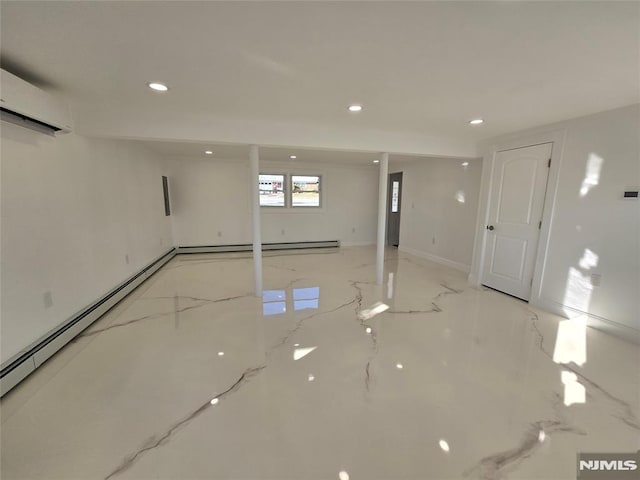 basement with a wall mounted air conditioner and baseboard heating