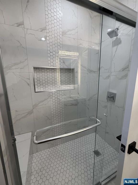 bathroom with walk in shower