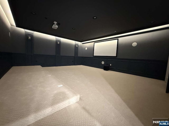 home theater room with carpet flooring