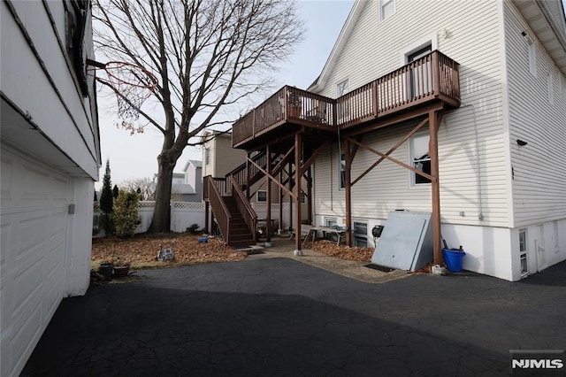 rear view of property with a deck