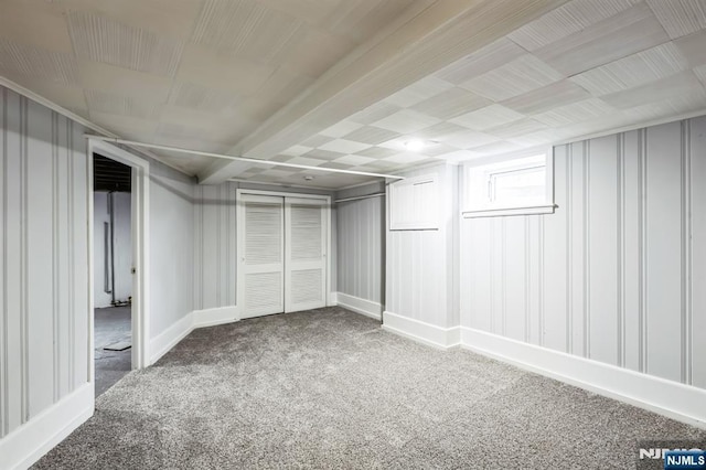 walk in closet with carpet