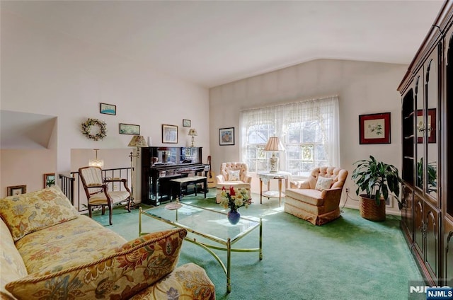 sitting room featuring carpet and vaulted ceiling