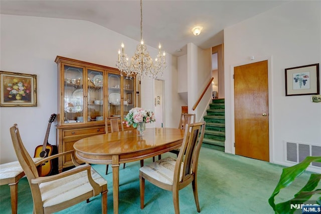 carpeted dining space with vaulted ceiling, stairway, visible vents, and an inviting chandelier