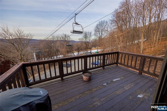 wooden terrace with grilling area