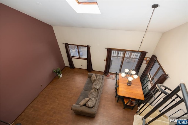 interior space with lofted ceiling with skylight