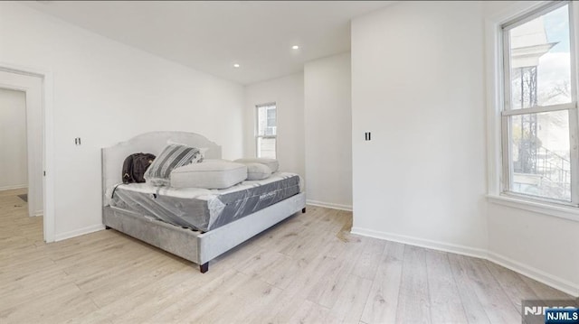 bedroom featuring light wood-type flooring