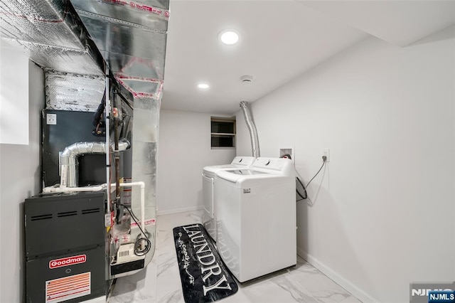 clothes washing area with independent washer and dryer