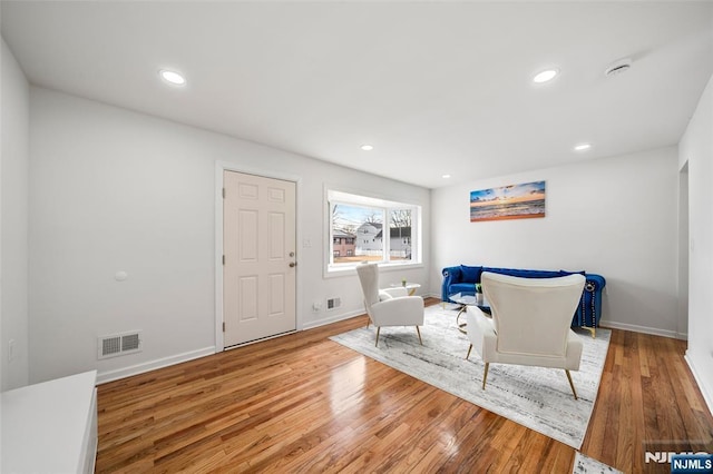 living room with hardwood / wood-style flooring