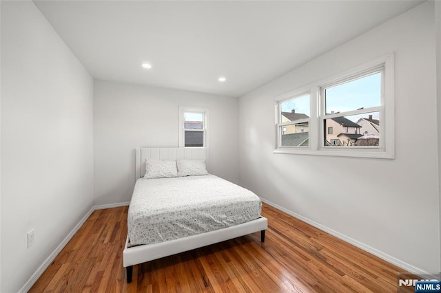 bedroom featuring hardwood / wood-style floors