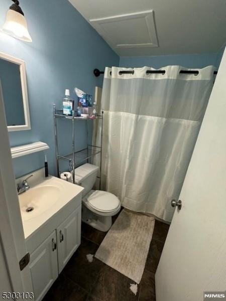 bathroom with vanity, tile patterned flooring, toilet, and a shower with shower curtain