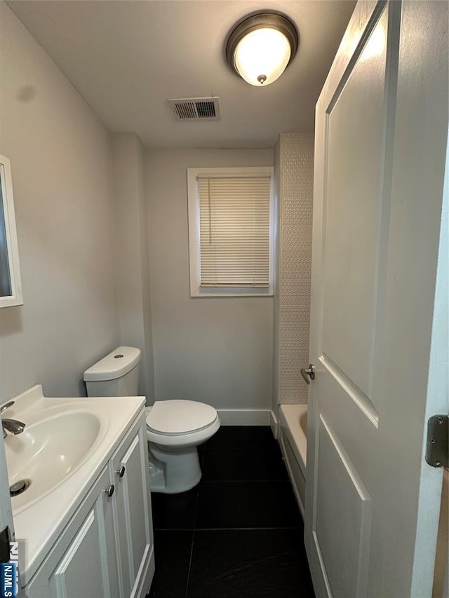 full bathroom with vanity, tile patterned floors, shower with separate bathtub, and toilet