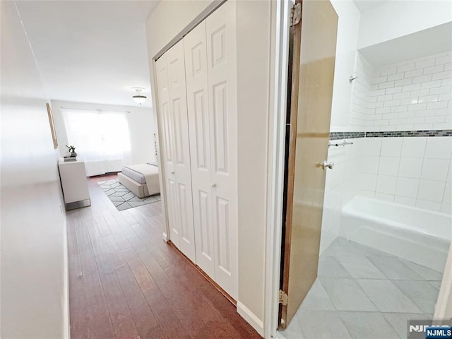 hall featuring hardwood / wood-style floors