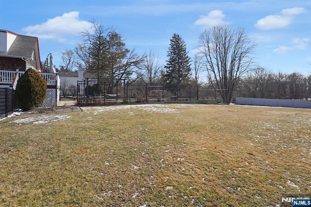 view of yard with a wooden deck