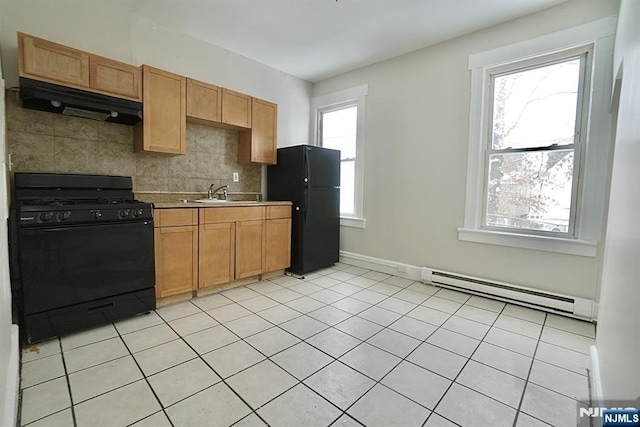 kitchen featuring sink, extractor fan, black appliances, decorative backsplash, and a baseboard radiator