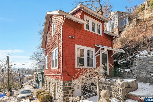 view of snow covered property