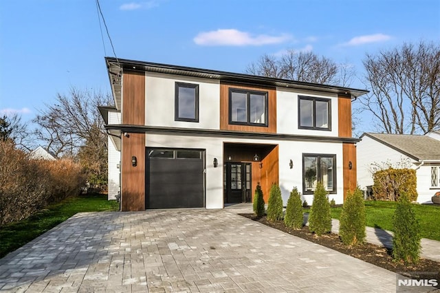 contemporary house featuring a garage