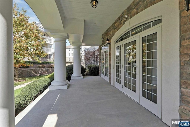 view of patio featuring french doors